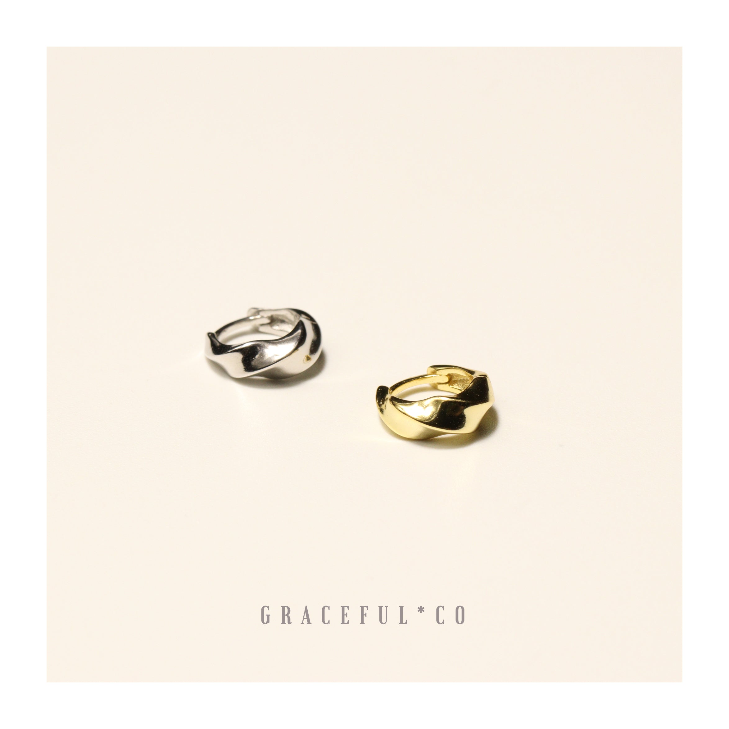 Dawn Twist Huggie Earrings